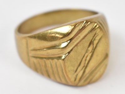 Lot 874 - A yellow metal gents ring, stamped 18k size V,...
