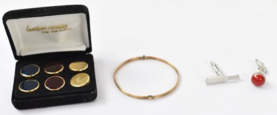 Lot 930 - A small yellow metal bangle, six yellow metal...