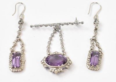 Lot 843 - A pair of 18ct white gold diamond and amethyst...