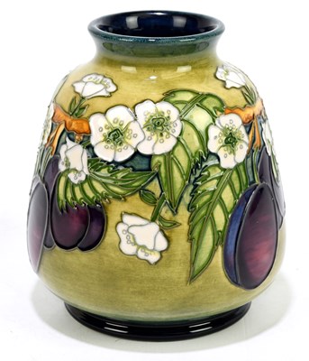 Lot 63 - DEBBIE HANCOCK FOR MOORCROFT; a squat vase...