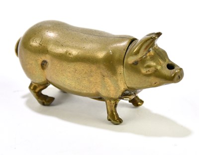 Lot 2475 - A novelty brass pig vesta case.