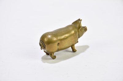 Lot 2475 - A novelty brass pig vesta case.