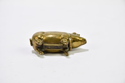 Lot 2475 - A novelty brass pig vesta case.