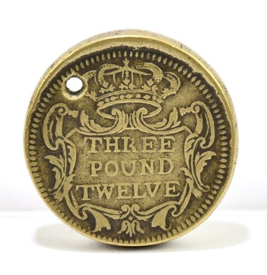 Lot 1506 - A £3 12 shilling brass coin weight.