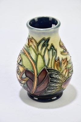 Lot 97 - PHILIP GIBSON FOR MOORCROFT; a squat baluster...