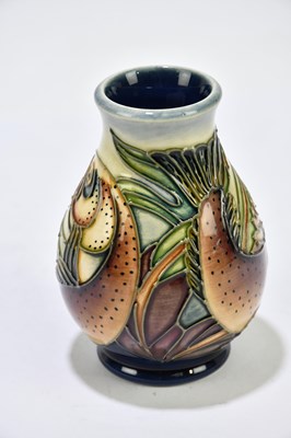 Lot 97 - PHILIP GIBSON FOR MOORCROFT; a squat baluster...