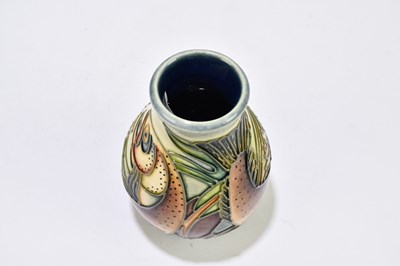 Lot 97 - PHILIP GIBSON FOR MOORCROFT; a squat baluster...