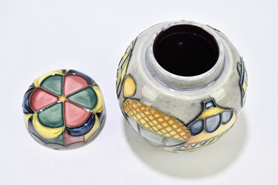 Lot 64 - JEANNE MCDOUGALL FOR MOORCROFT; a small ginger...