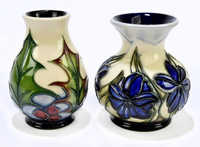 Lot 51 - MOORCROFT; two vases, to include an example...