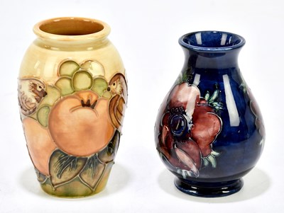 Lot 70 - SALLY TUFFIN FOR MOORCROFT; a cylindrical vase...