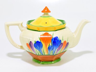 Lot 201 - CLARICE CLIFF; an octagonal shaped teapot in...