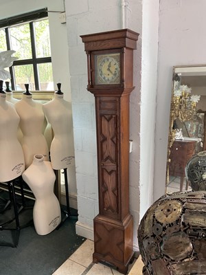 Lot 124 - An early 20th century oak longcase clock of...