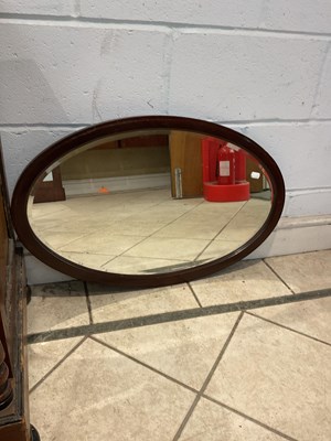 Lot 118 - An Edwardian oval wall mirror, also a gilt...