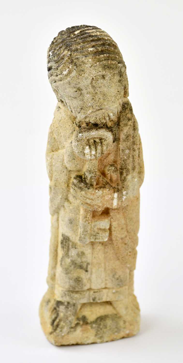 Lot 2362 - A carved stone figure of St Peter, possibly...