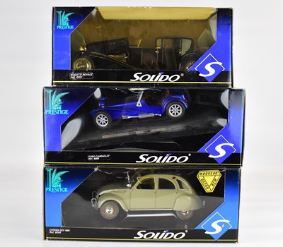 Lot 322 - SOLIDO; three boxed diecast scale model cars...