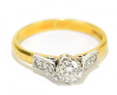 Lot 69 - An 18ct gold and diamond solitaire ring, size...