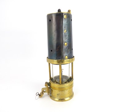 Lot 102 - A vintage brass and steel bound miner's lamp