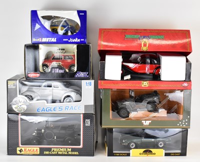 Lot 317 - Seven boxed diecast scale model vehicles to...