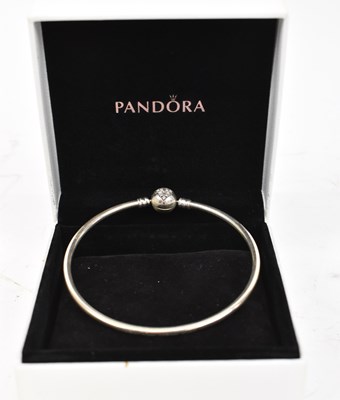 Lot 664 - PANDORA; a hallmarked silver lady's bangle...