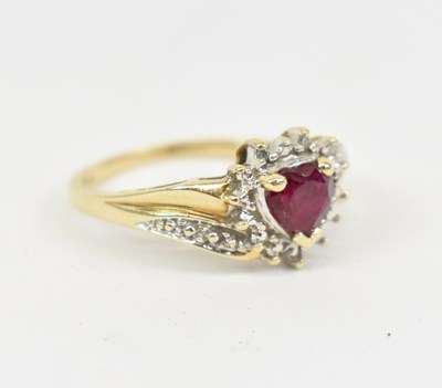 Lot 631 - A 9ct yellow gold dress ring set with heart...