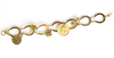 Lot 1171 - A 9ct gold charm bracelet, the links in the...