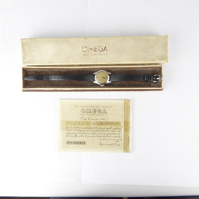 Lot 1403 - OMEGA; a ladies' vintage chrome wristwatch,...
