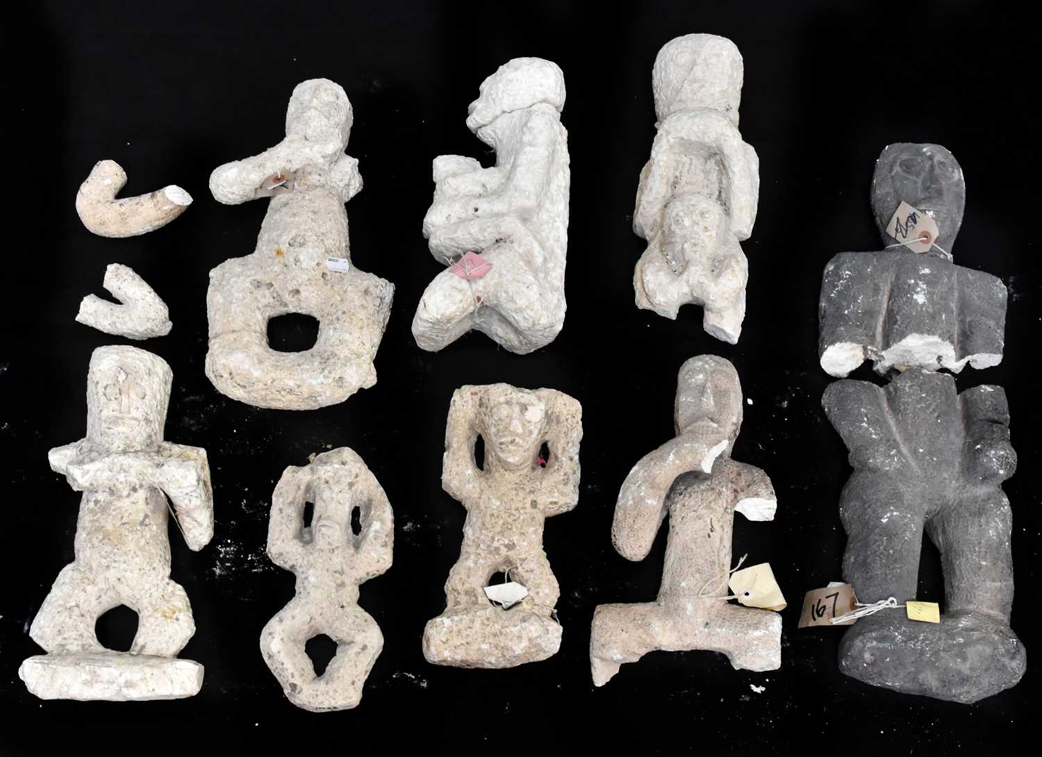 Lot 2341 - A collection of eight Iniet carvings, East