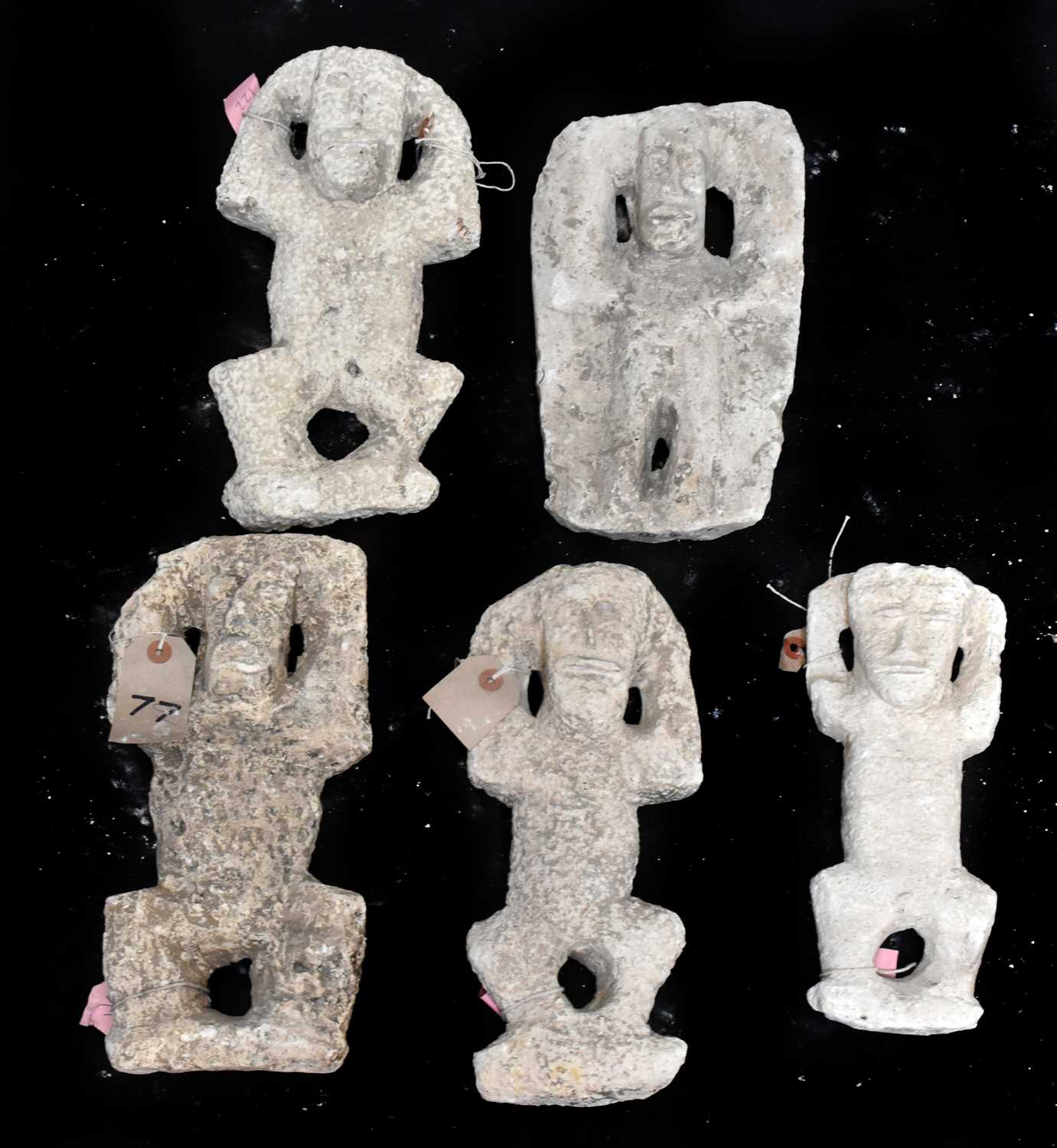 Lot 2343 - A collection of five Iniet carving