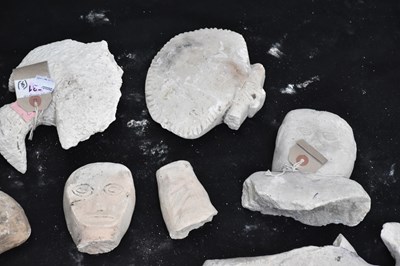 Lot 2345 - A collection of Iniet carving fragments, East...