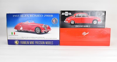 Lot 307 - Three boxed diecast scale model vehicles...