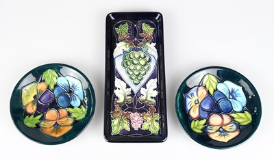 Lot 36 - MOORCROFT; two circular pin dishes produced...