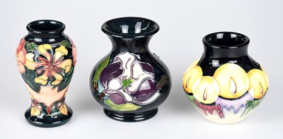 Lot 35 - MOORCROFT; three small vases, including an...
