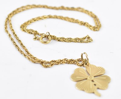 Lot 901 - An 18ct yellow gold necklace with yellow metal...