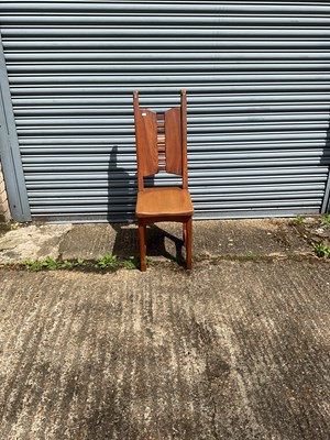 Lot 73 - An Arts & Crafts style oak and walnut side chair.