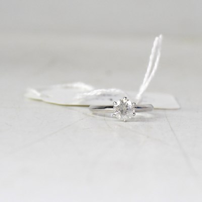 Lot 843 - A 14ct white gold and diamond solitaire ring,...