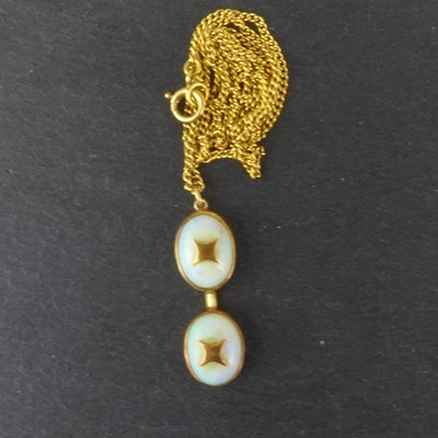 Lot 1228 - A 9ct gold dainty necklace with hoop fastener,...