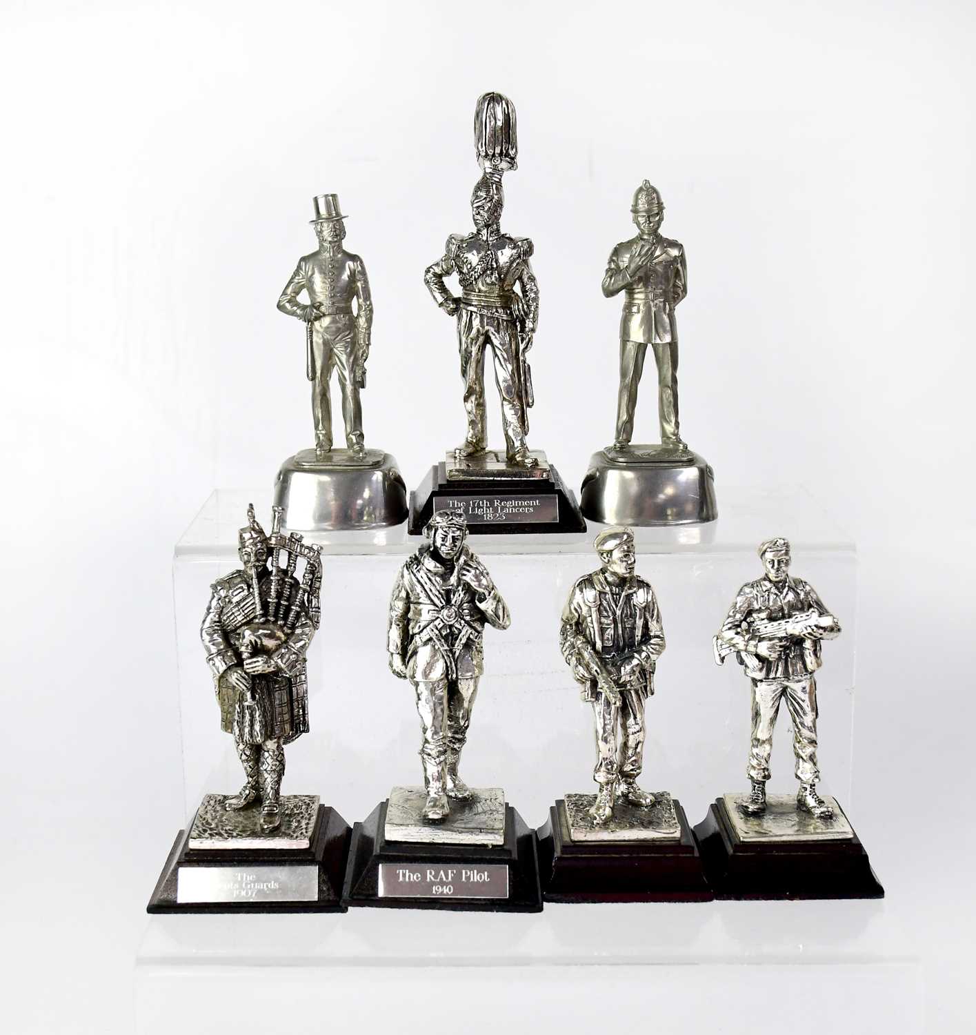 Military Figure Rip Lot 431 - Five plated military figures comprising two