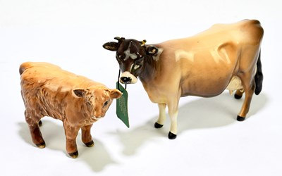 Lot 613 - BESWICK; two figures to include a cow and a...