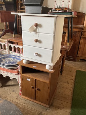 Lot 205 - Two pine bedside cupboards, including a white...