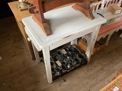 Lot 209 - A vintage kitchen table with enamelled top on...