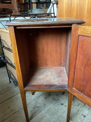 Lot 237 - An Edwardian inlaid mahogany pot cupboard on...