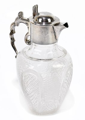 Lot 1054 - An early 20th century cut glass and silver plated claret jug