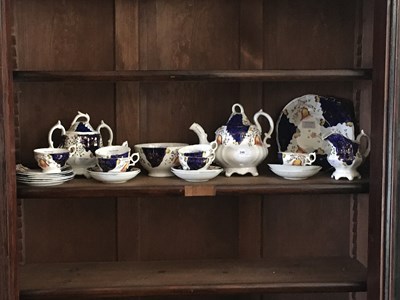 Lot 246 - A 19th century Gaudy Welsh tea service.