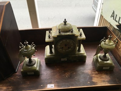 Lot 265 - An early 20th century onyx clock garniture,...