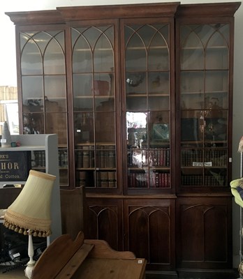 Lot 1225 - A 19th century Gothic oak breakfront bookcase...