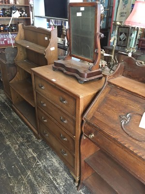 Lot 295 - A 1930s oak effect chest of four drawers,...