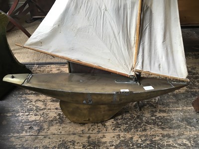 Lot 309 - A vintage model pond yacht, length 90cm.