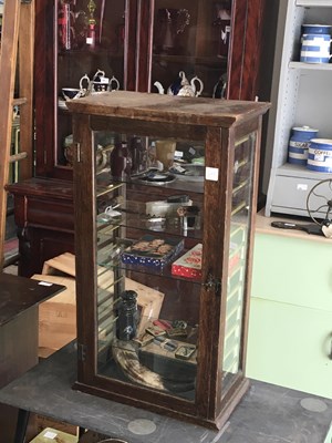 Lot 312 - An oak table top collector's cabinet with four...