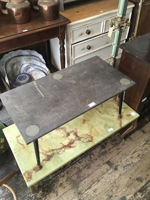 Lot 313 - A vintage coffee table with onyx effect top on...