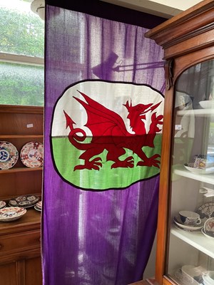 Lot 332 - A vintage Welsh flag representing a passant...